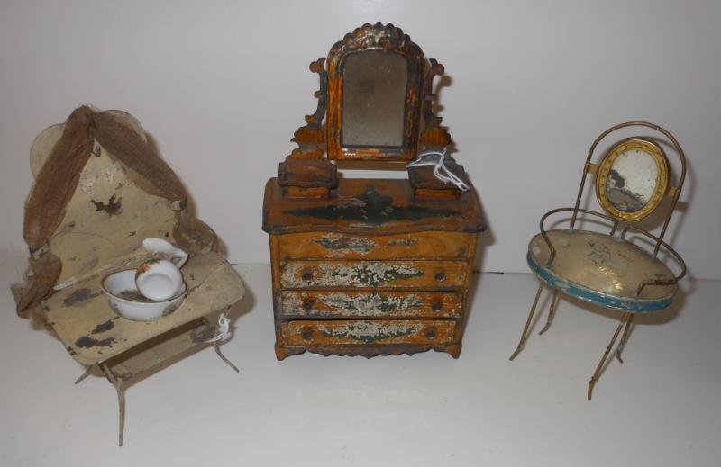 THREE PIECES DIMINUTIVE METAL DOLL FURNITURE: Yellow three drawer dresser with mirror, and two wirework vanity's.