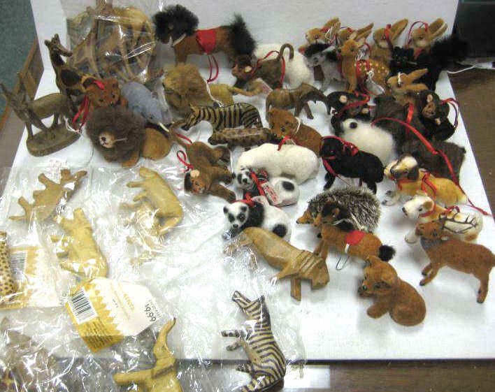 COLLECTION OF WOODEN AND STUFFED ANIMALS: German velour and plush miniature animals as ornaments retailed by Lord & Taylor and collection of Kenyan hand carved Safari animals, total 32 pieces.
