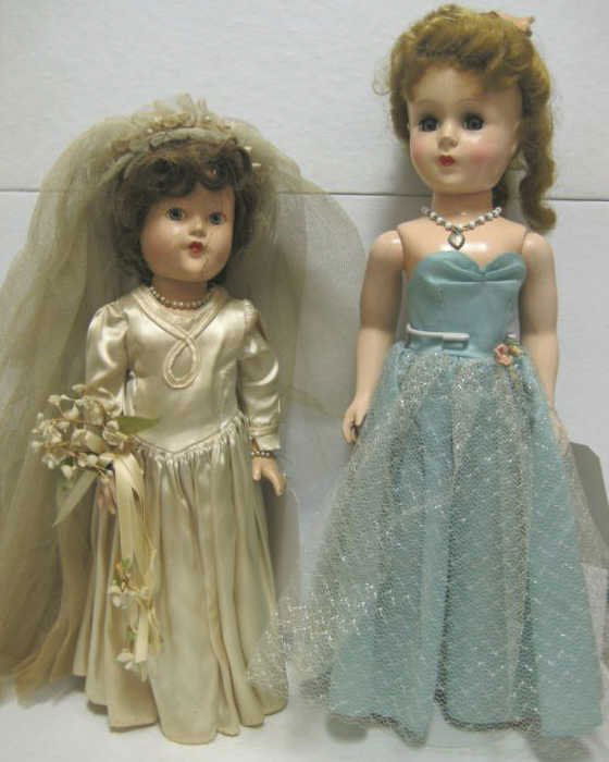 15" TWO AMERICAN DOLLS: 15" Effanbee composition Bride doll with painted eyes and closed mouth (imperfection to face) and 17" unmarked hard plastic Bride's Maid doll.