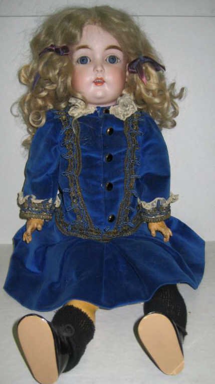22" KESTNER CHILD DOLL, #171: Bisque head with sleep eyes and open mouth, marked head, jointed composition body, wearing blue velvet dress.
