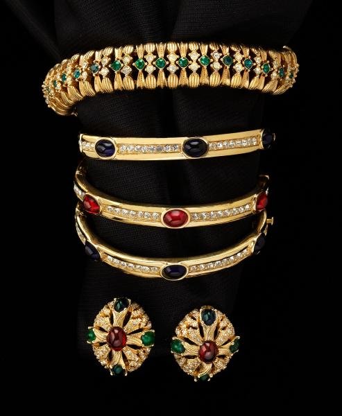 Ciner vintage jewelry including rhinestone and: colored stone bangle bracelets, earrings and link bracelet.