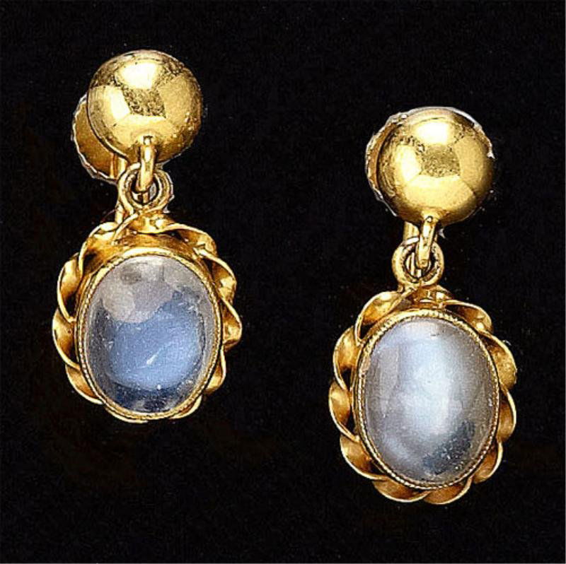 Moonstone dangling earrings: 14k yellow gold screw-back earrings dangling two moonstones measuring 8mm x 6.5mm. 3.3 grams.