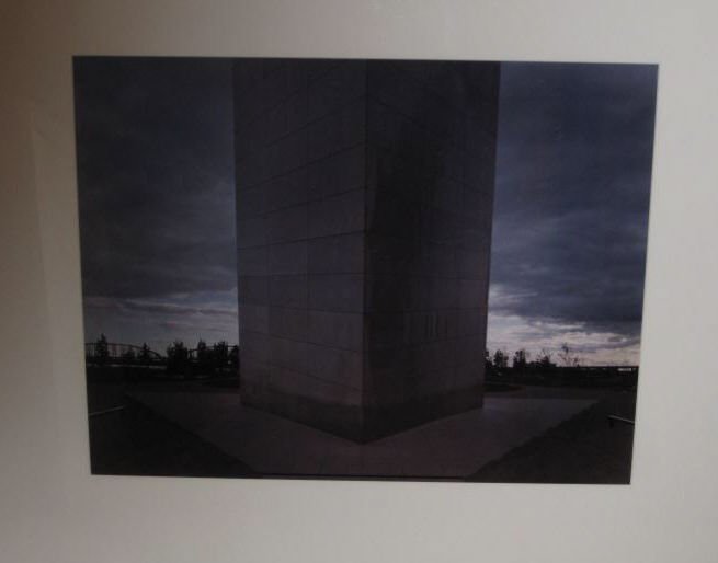 JOEL MEYEROWITZ, AMERICAN (B.1938): BASE OF ARCH, DARK CLOUDS, 1978, #7 from the portfolio of twelve, ST. LOUIS AND THE ARCH, Dye transfer print, 65/75, signed and numbered, published by the Greenberg Gallery, St. Louis, framed. 16 1/2