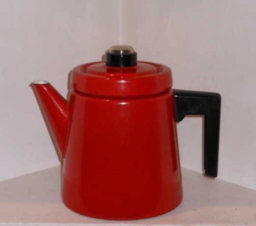 ANTTI NURMESNIEMI, FINNISH (1927-2003): COFFEE POT, red enameled metal, by Finel. 7 1/2 inches