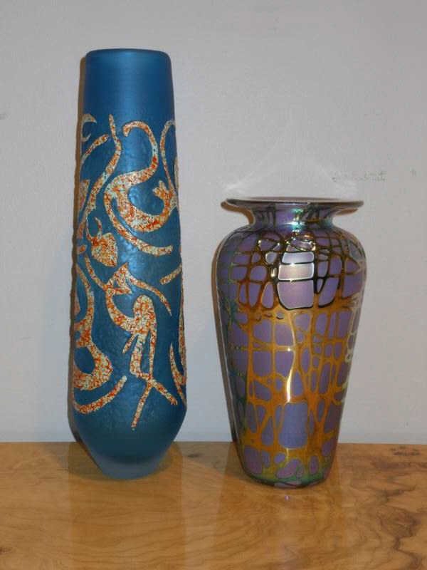 TWO CONTEMPORARY GLASS VASES: Stuart Abelman purple and iridescent vase, together with a blue acid etched tall slender vase. 11 3/4 & 8 inches