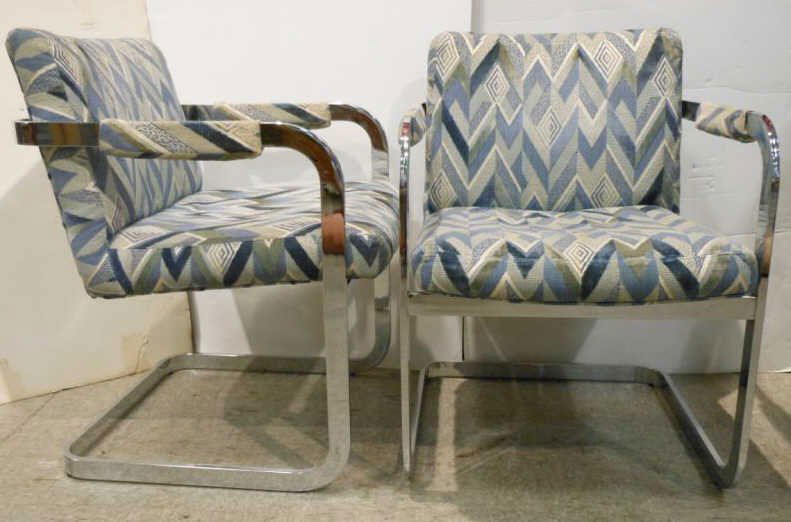 MILO BAUGHMAN FOR THAYER COGGIN: Pair of chairs, 1972, chrome steel and upholstery, labeled, together with a roll of unused replacement fabric. 32 x 23 inches
