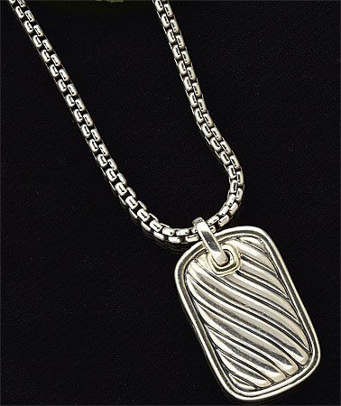 DOG TAG NECKLACE DAVID YURMAN: Sterling silver pendant with 14k yellow gold detail measuring 1 1/2 inches x 1 inch suspended on a sterling chain. 20 inches.