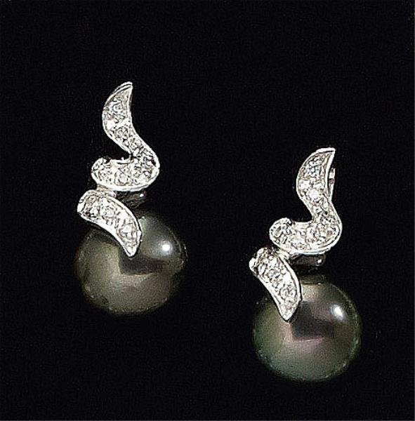 TAHITIAN PEARL AND DIAMOND EARRINGS: 18k white gold earrings set with eighteen round brilliant cut diamonds weighing .10ct.t.w and two 9mm grey pearls. 5.1 grams.