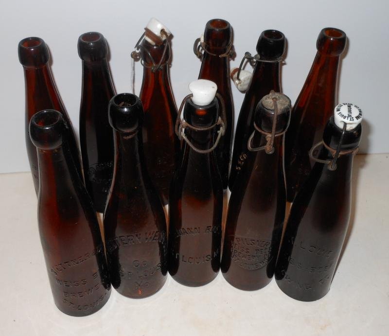 COLLECTION OF 11 VINTAGE EMBOSSED BEER BOTTLES: All amber and St. Louis related, including 7 assorted Weiss Beer (4 wit "This Bottle is Never Sold" to backside), Great Western Weiss, 2 assorted Wittemann-Rost and a Geo. Schroeder (East St. Louis), 