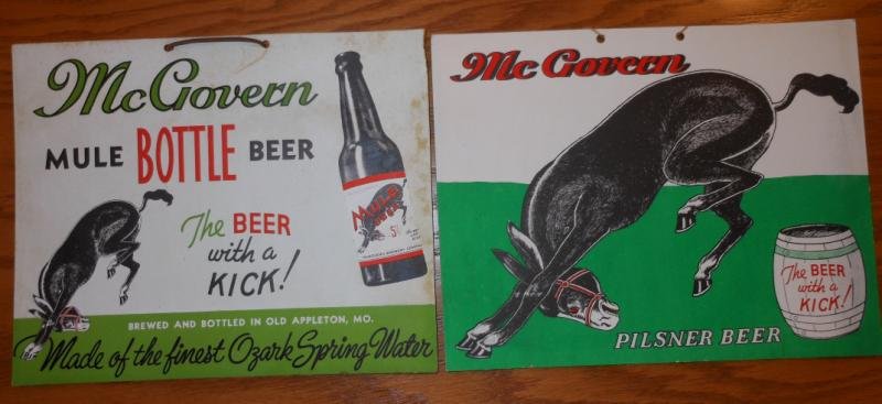 TWO RARE "McGOVERN" CARDBOARD SIGNS: For "Mule Bottle Beer - The Beer with a KICK", central Missouri brewery. Henry Herbst Collection