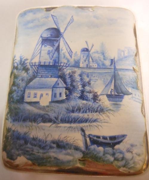 SCHEIBLER STERLING AND ENAMELED CIGARETTE CASE: Front showing Dutch windmill scene, slight loss to enamel, 2 1/2 x 3 in.