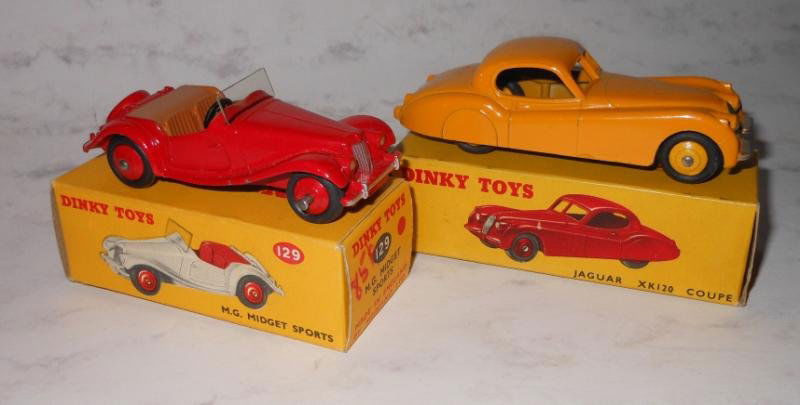 TWO DINKY TOYS IN ORIGINAL BOX: Like new condition, including a M.G. Midget Sports 129 in red, and Jaguar XK120 Coupe 157 in yellow.