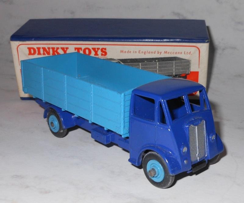 DINKY GUY 4-TON LORRY 511: Like new in original box, navy cab & frame, light blue open bed.