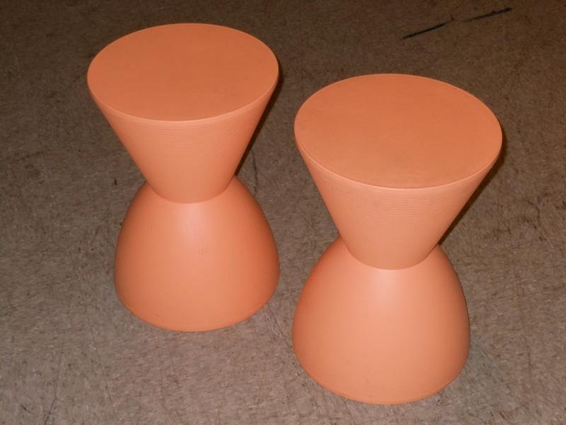 PHILIPPE STARCK FOR KARTELL: Pair of Prince Aha stools, orange plastic, molded label. 17 inches