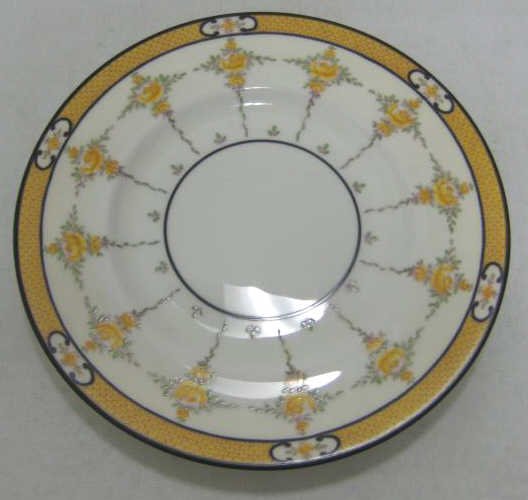 MINTON PORCELAIN SALAD PLATES: Yellow Rose pattern (B970), black outlined yellow rims, circa 1900, set of twelve, for J. Dolfinger & Co., Louisville, KY. Diameter 9 in.