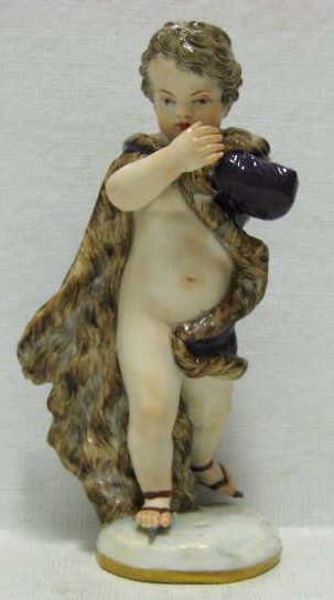 MEISSEN PORCELAIN SEASON FIGURINE: Modeled after Kaendler Allegorical of Winter, putto in cloak, wearing ice skates, # A71, 19th century. Height 5 1/4 in