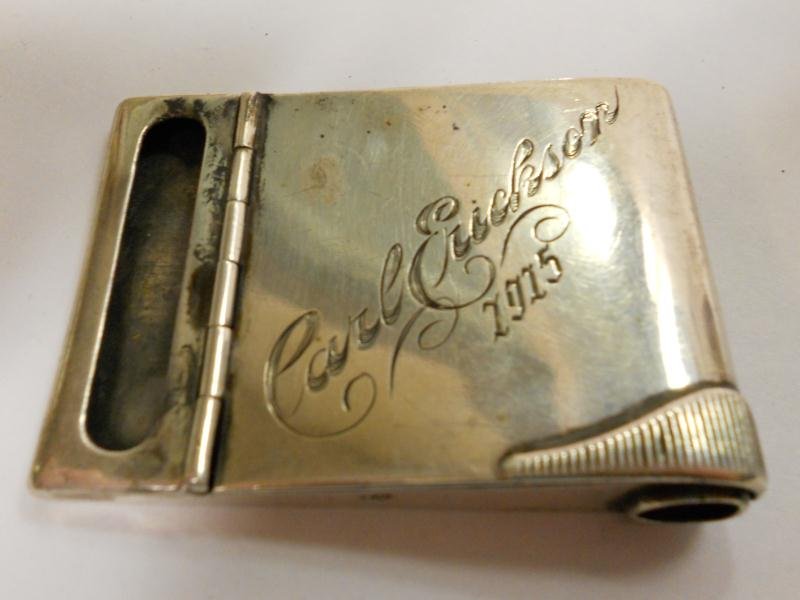 STERLING 1915 MATCHBOOK HOLDER: With built-in cigar cutter.