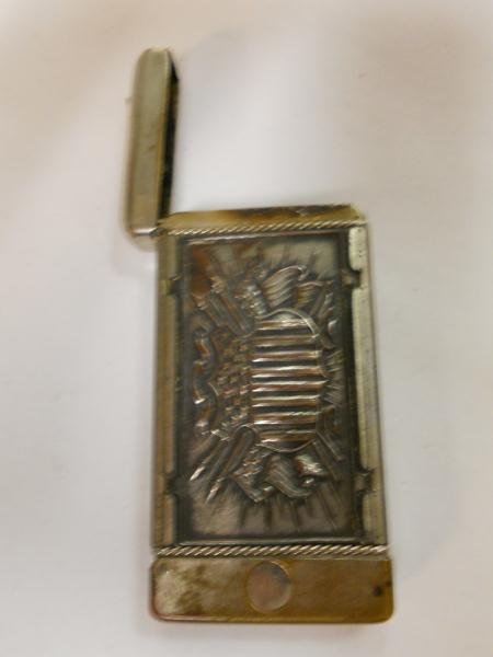 PLATED SILVER MATCHSAFE / CIGAR CUTTER: Decorated with eagles and shield form U.S. flag.