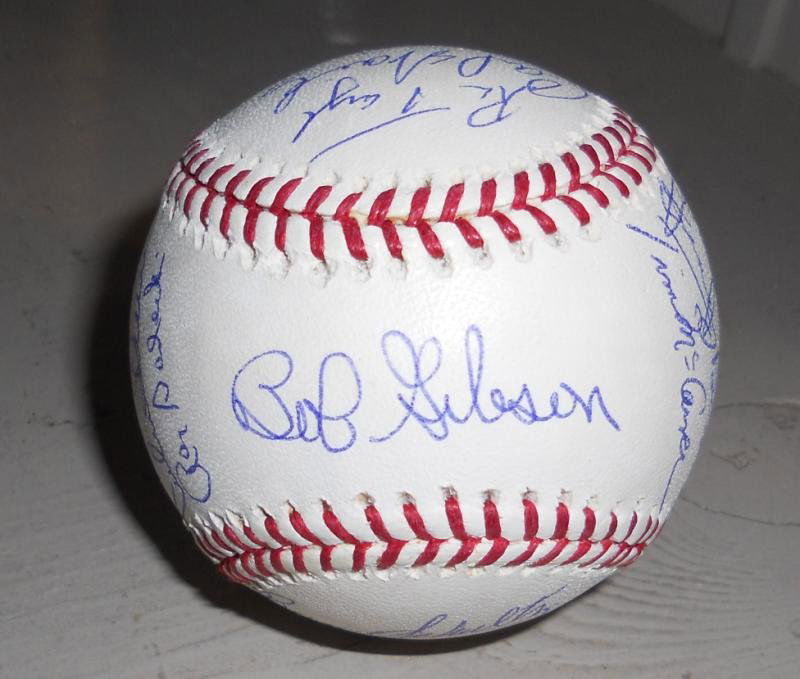 CARDINALS CARE TEAM SIGNED BASEBALL: Members of the 1964 St. Louis Cardinals, on a Selig Official Major League ball, including Brock, Gibson, Schoendienst, Washburn, McCarver, Schultz, and many more.