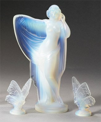 SABINO ART DECO GLASS: Female figure and two butterflies; Sabino glass, marked Sabino, Paris. (total 3 pieces) Height of figure 7 3/4 inches, width 4 1/2 inches