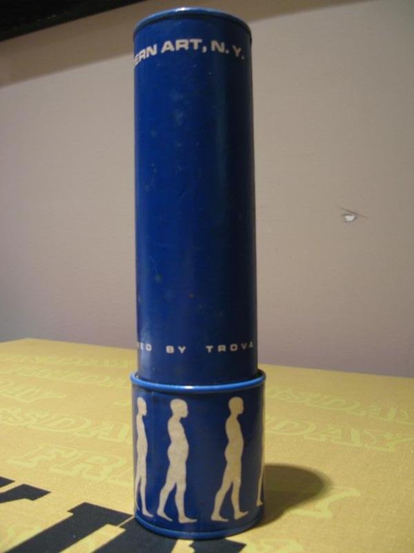 ERNEST TROVA, AMERICAN (1927-2009): Kaleidoscope from the Museum of Modern Art, NY designed by Trova, cardboard and plastic. 8 1/2 x 2 1/2 inches