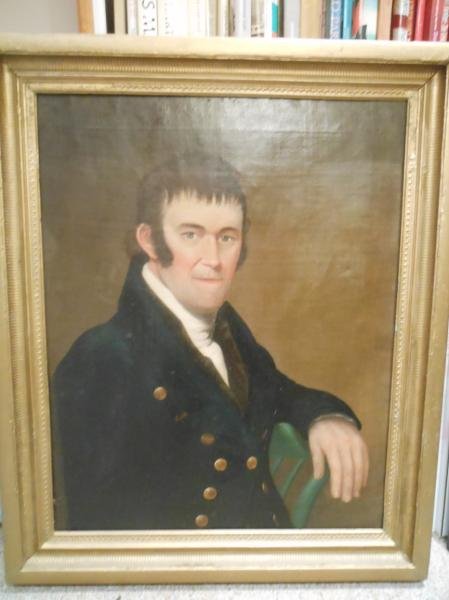 AMERICAN SCHOOL EARLY 19TH CENTURY: Portrait of a man seated in a green Windsor chair, oil on canvas, gilt framed. 29 x 23 inches