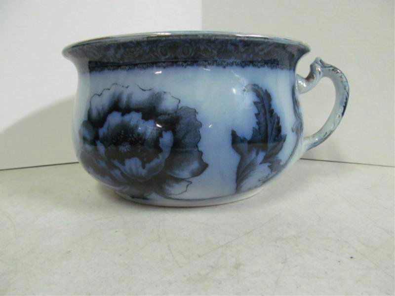 STAFFORDSHIRE CHAMBER POT: Blue and white Staffordshire chamber pot with "Poppea" design having Grimwade mark underfoot, circa 1891-1900 Height 5 1/4 x diameter 9 inches
