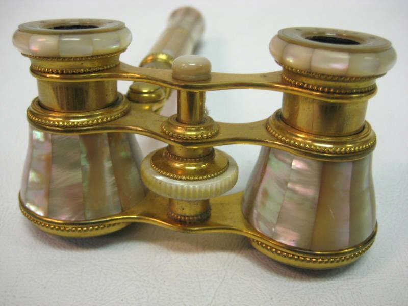 LEMAIRE FAB., PARIS OPERA GLASSES: Mother-of-pearl highlights allover the gilt metal. 6 1/4 x 4 in.