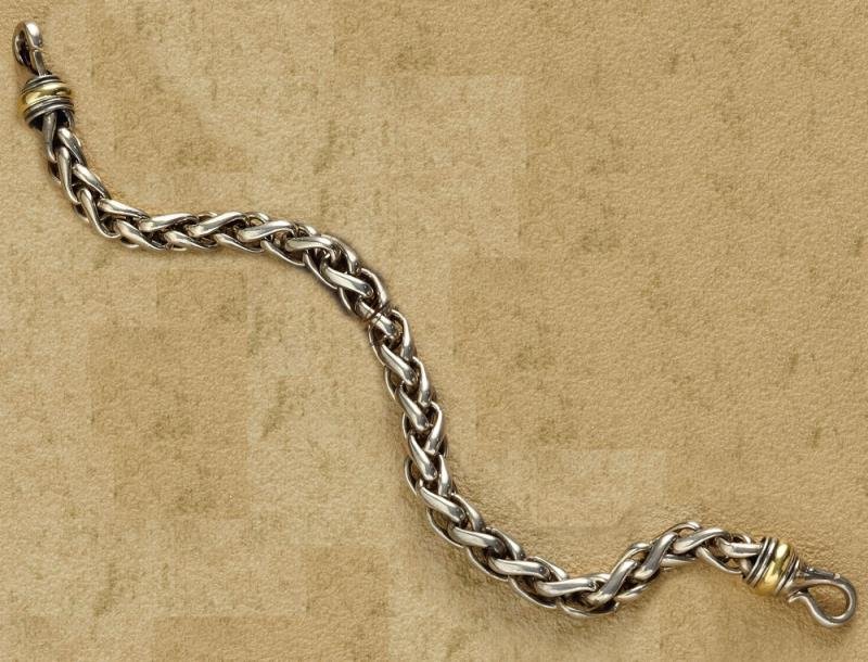 MAN'S WHEAT CHAIN BRACELET, DAVID YURMAN: Sterling silver 8mm bracelet in the classic wheat chain pattern with 18k yellow gold accent. 9 inches. 50.5 grams.