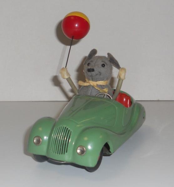 SCHUCO SONNY-MOUSE 2005: Tin windup car with mouse, length 5 1/2 inches.