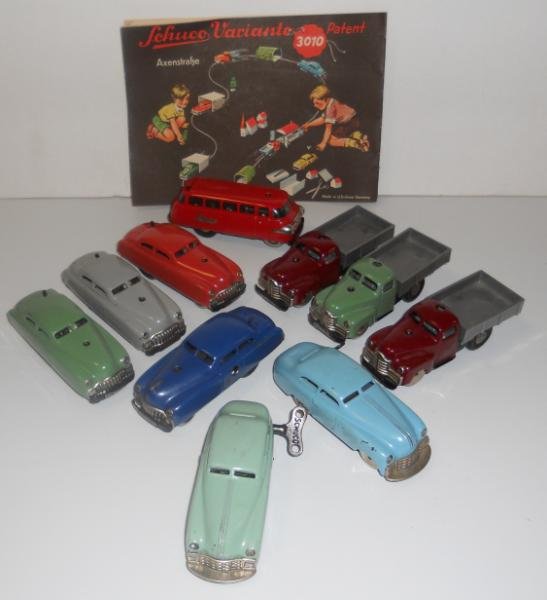 TEN SCHUCO CARS: Three Varianto-Lasto 3042 trucks, a Varianto-Bus 3044 and four Varianto-Limos 3041; together with a partial Varianto 3010 track and two 1001 Mirako cars.