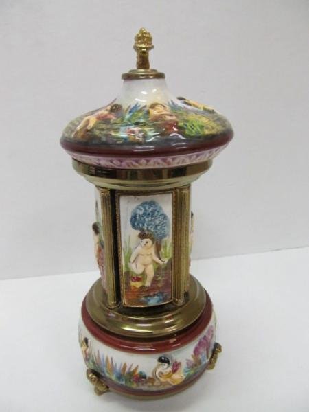 VINTAGE CAPODIMONTE MUSICAL CIGARETTE DISPENSER: Porcelain mounts, dancing ballerina to the center.
