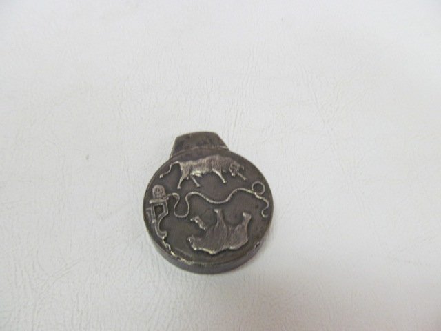 STERLING STOCK MARKET LIGHTER: Showing bull and bear with ticker tape running.