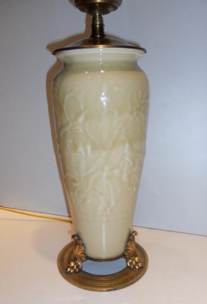ROOKWOOD ART POTTERY TABLE LAMP: Matte yellow production vase having raised molded Fuchsia design with original factory fittings, shape 6045, dated 1945, logo mark underfoot. Vase Height 11 1/2 in., overall height 24 in.