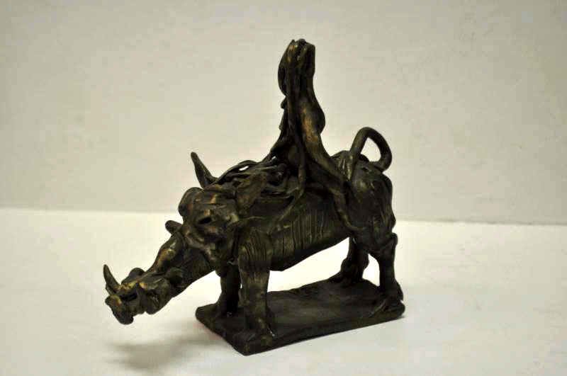 JOHN KEARNEY, AMERICAN/CHICAGO (B.1924): LADY GODIVA ON WARTHOG, bronze figure. Height 6 1/2 in., width 3 in., length 7 in.