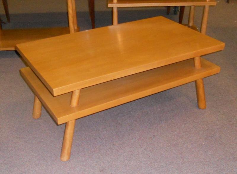 T. H. ROBSJOHN-GIBBINGS FOR WIDDICOMB: Coffee table, rectangular top with lower shelf, on inverted tapering legs, labeled for the designer. Height 16, width 21, length 36 in.