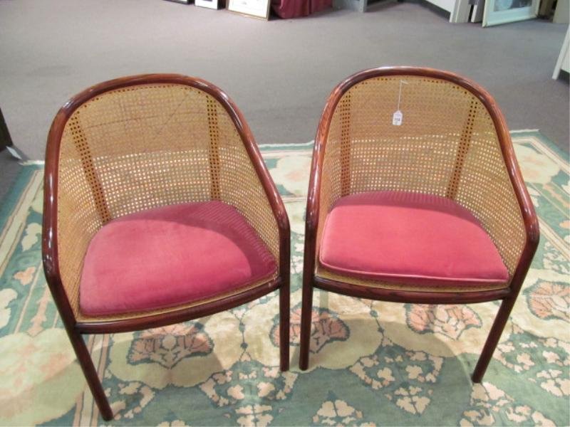 WARD BENNETT: Set of four ash and cane armchairs, with wrap around armrests, cordovan finish. Height 33 in., width 23 in.