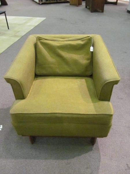 FRANK LLOYD WRIGHT FOR HERITAGE HENREDON: Club chair having Taliesin design to leg edges, upholstered in green fabric. Height 27, width 33, depth 33 in.