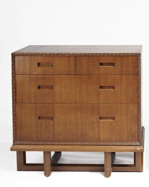 FRANK LLOYD WRIGHT FOR HERITAGE HENREDON: Chest of drawers, pair of short drawers over two long resting on base, numbered 2004 with script logo to reverse. Height 33, width 34, depth 20 in.
