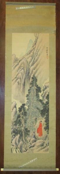 CHINESE LANDSCAPE HANGING SCROLL: Watercolor mountain landscape with figure of man in red robe, signature with artist seal, with fitted case. 16 1/4 x 52 1/2 in.
