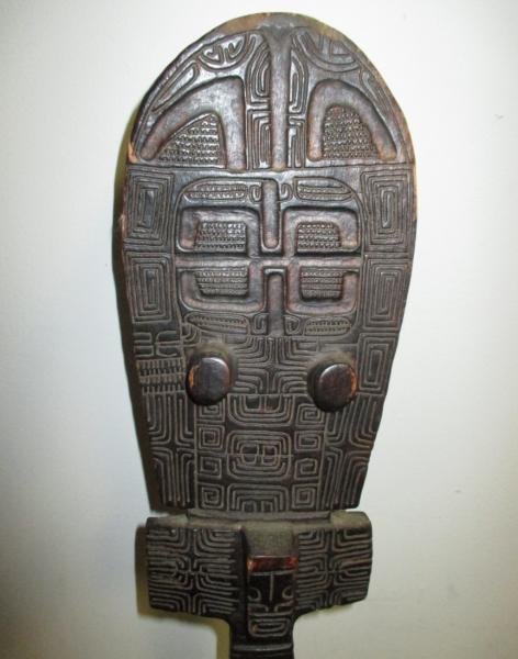 POLYNESIAN CARVED WOOD CLUB, MARQUESAS ISLANDS: Uu Uu War Club having geometric stylized carved decoration. Height 48 in.