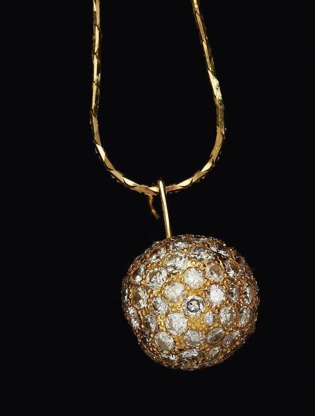 DIAMOND BEAD PENDANT: 14k yellow gold ball with pave' set round brilliant cut diamonds weighing approximately 2.25ct.t.w. Pendant is suspended on a 14k yellow gold square snake chain. 18 inches. 6.3 grams.