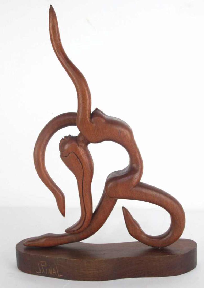 J. Pinal Artist - Sculpture: Carved wood sculpture by Mexican artist Jose Pinal depicting a nude female figure. Signed J. Pinal to base. 17 inches height, 12 inches width, 4 inches depth. 17"H x 12"W x 4"D Measurements: 17"H x 12