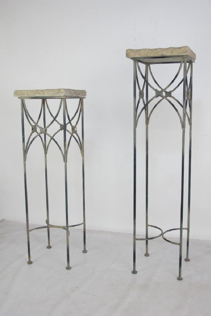 Two Stone Top Stands: Two gray squared stone top tables having wrought iron bases. 50 inches height, 13 inches width, 13 inches depth. 50"H x 13"W x 13"D Measurements: 50"H x 13"W x 13"D Notes: Please carefully read our te