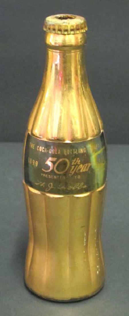Coca-Cola 50th Anniversary Gilt Bottle (1 of 8)