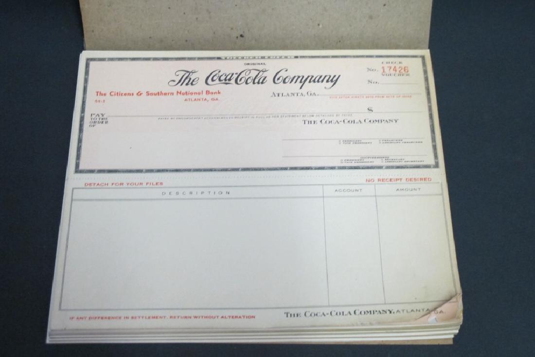 Vintage Coca-Cola Company Checkbook: Checkbook from the Coca-Cola Company, belonging to former president William J. Hobbs. Includes unused checks dating to the 1940s-50s. 7 inches height, 8.5 inches width. 7"H x 8.5"W Wear from age and u