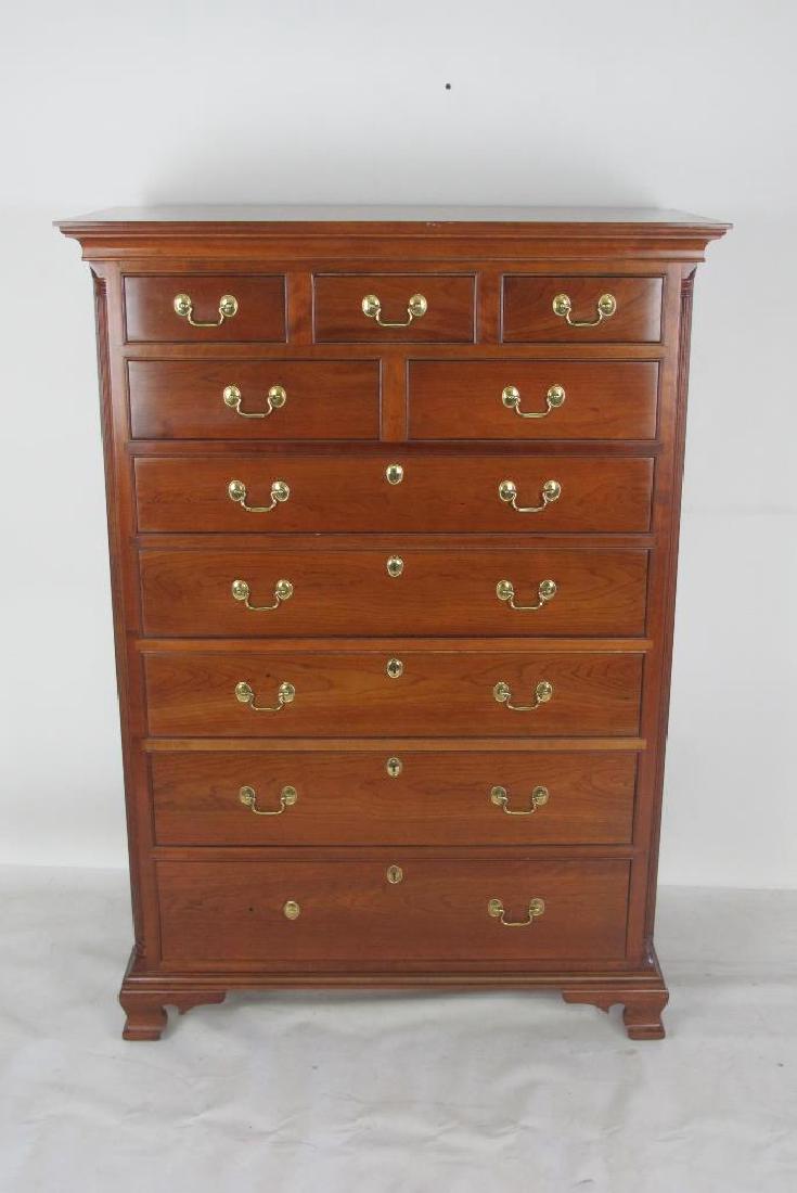 Stickley Chest: Wood chest having 10 drawers with brass bail pulls. By Stickley. 60.5 inches height, 42.5 inches width, 21 inches depth. 60.5"H x 42.5"W x 21"D Measurements: 60.5"H x 42.5"W x 21"D Note:Please careful