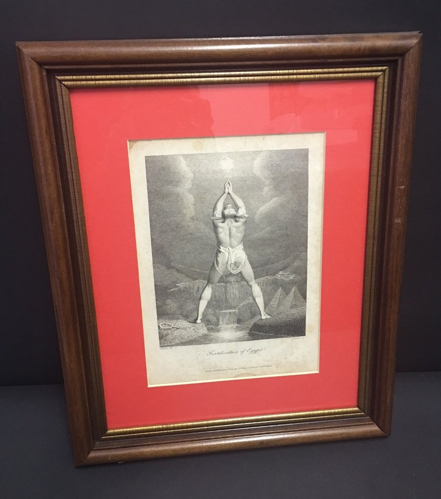 William Blake "Fertilization of Egypt" Engraving: Engraving signed in plate W. Blake titled "Fertilization of Egypt" after a drawing by H. Fuseli. Depicting the god Anubis with a dog head praying over land with pyramids. Housed in a wood frame. 10 in