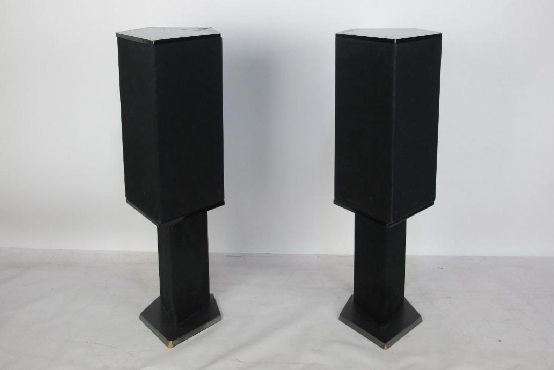 Pair of Soundwave Silhouette Speakers: Two Soundwave Silhouette speakers, number 0179. Having polygonal form with matching stands. Light wear from use. 20 inches height, 12 inches width, 16 inches depth. 20"H x 12"W x 16"D 20"H x 12"W x 16