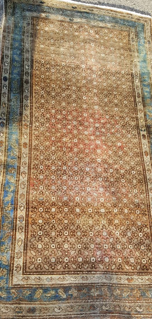 Malayer Rug: Persian Malayer rug having foliate motif in tones of brown with a blue border. 6 feet 8 inches width, 3 feet 5 inches depth. 6'8"W x 3'5"D